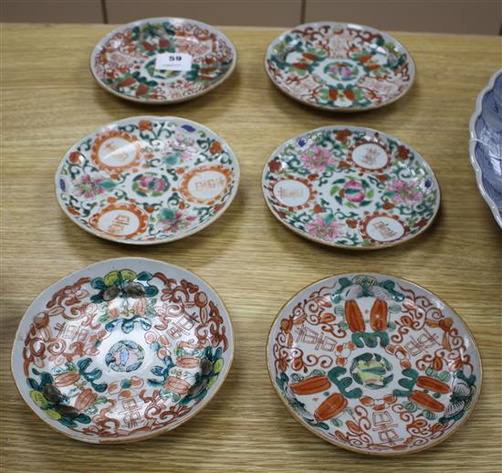 A near set of six 19th century Chinese famille rose saucer dishes, each painted with fruit and shou characters, diameter ranging 16.3cm